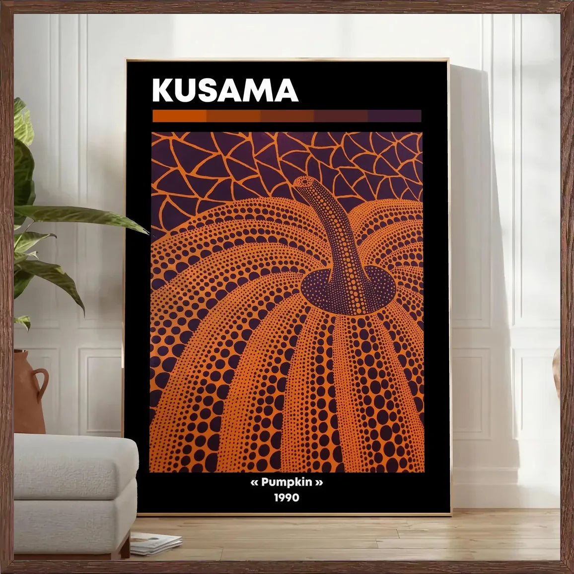 Cadre chene clair entourant l'affiche Kusama citrouille orange